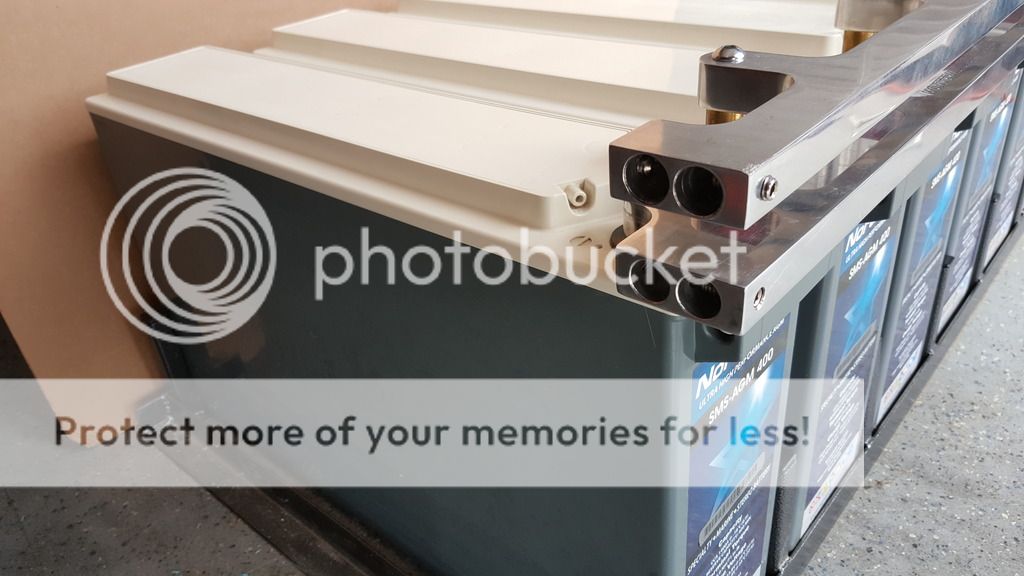 Six Northstar NSB SMSAGM 400 batteries with rack and billet buss bars